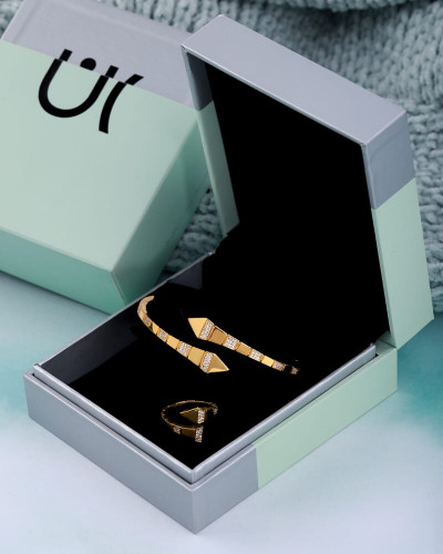 Golden bracelet and ring set for women