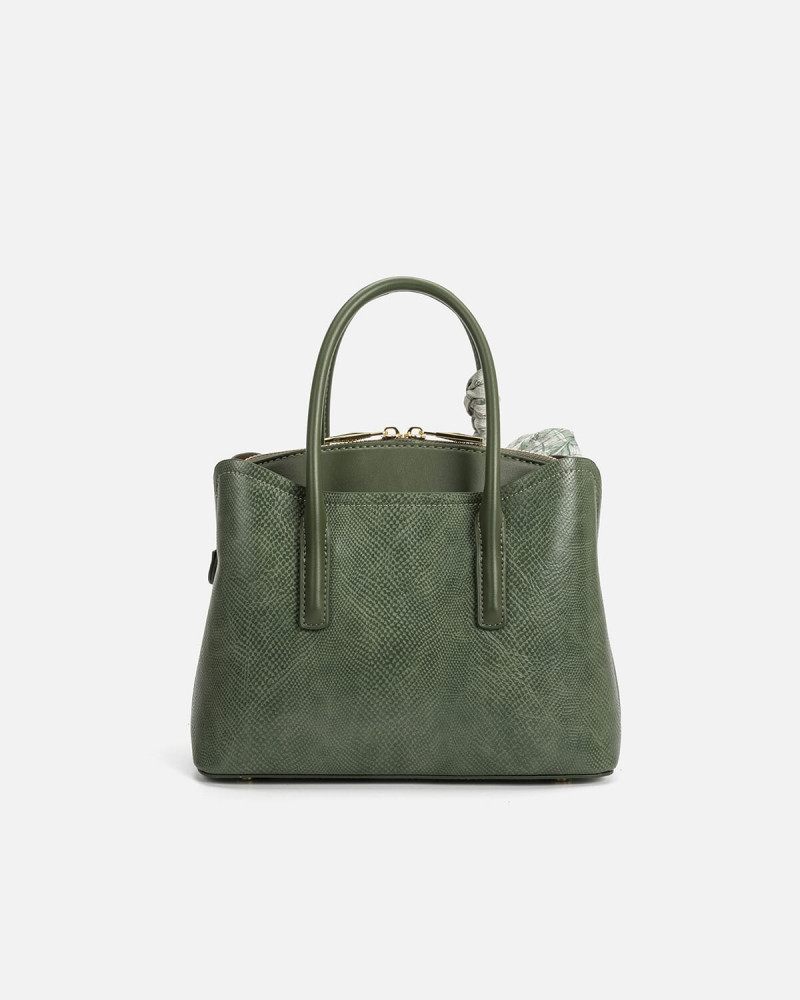 A women's bag of green leather