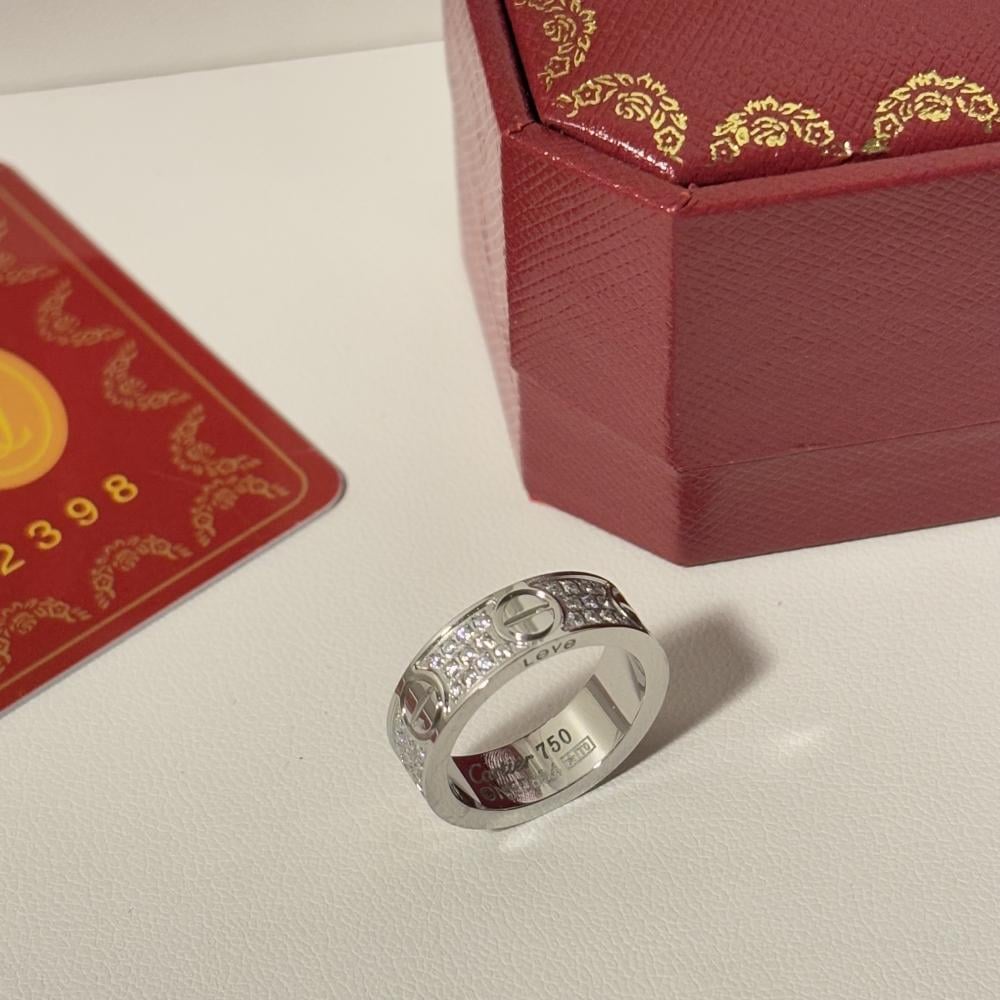 خاتم كارتير لوف نسائي فضي ستيل عريض مرصع بالكامل