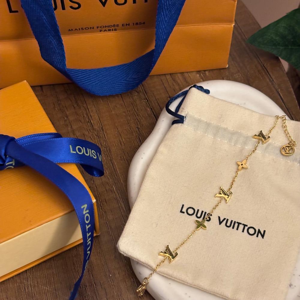 سوار لويس فيتون ذهبي مونوغرام ناعم