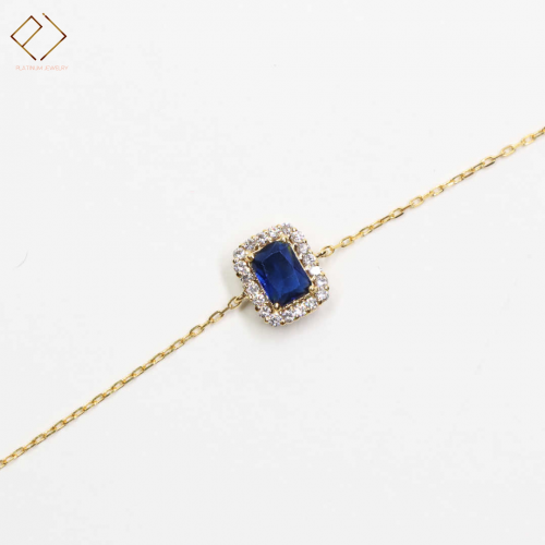 اسواره ذهب مرصعة بالالماس ينتصفها حجر زفير معالج