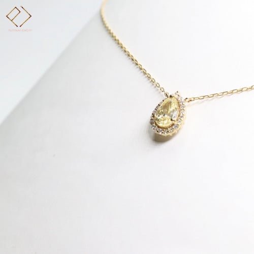 سلسال ذهب مرصع بحبات الالماس ينتصفة حجر سترين معالج