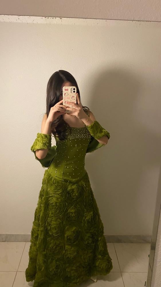 فستان زهرة الزمرد