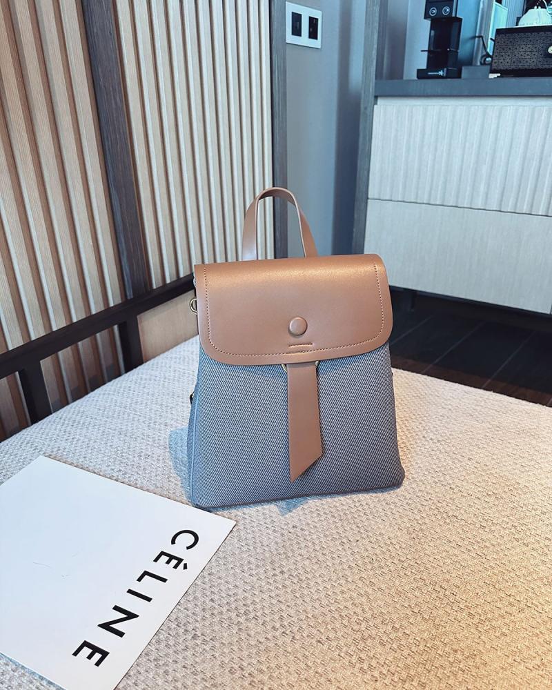 شنطة ظهر من الجلد باللون الرمادي والبني