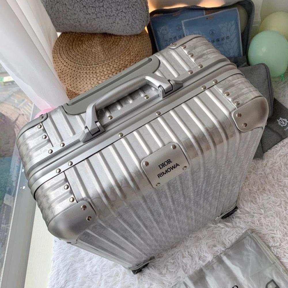 DIOR AND RIMOWA