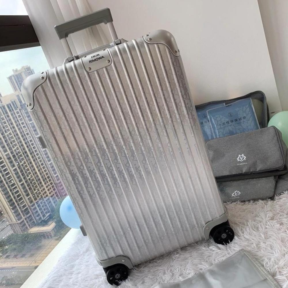 DIOR AND RIMOWA