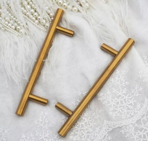 مسكات صواني ذهبي