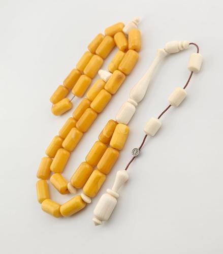 سبحه كهرمان بعاج برميلي 33 خرزه