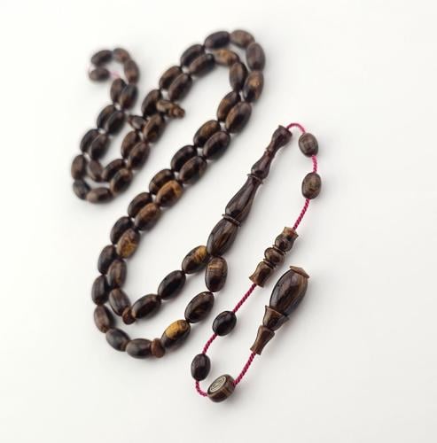 سبحه فاتوران ناعمه بلون دارسيني معرق و خرز صنوبري قياس 5.5 في 9.5 ملم 55 خرزه