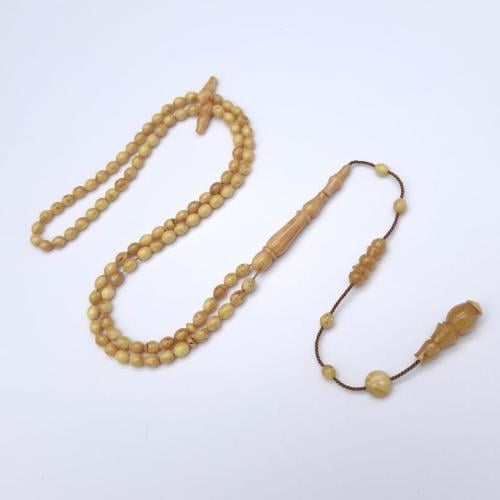 سبحه فاتوران ناعمه بلون عسلي و خرز زيتوني قياس 4 في 5 ملم 99 خرزه