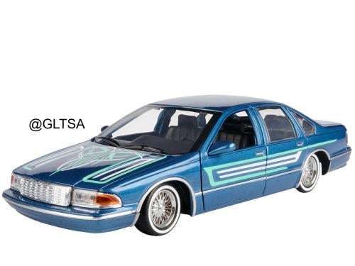 Chevrolet Chevy Caprice Lowrider Blue Metallic with Graphics 1:24 MotorMax 79022BLGRN