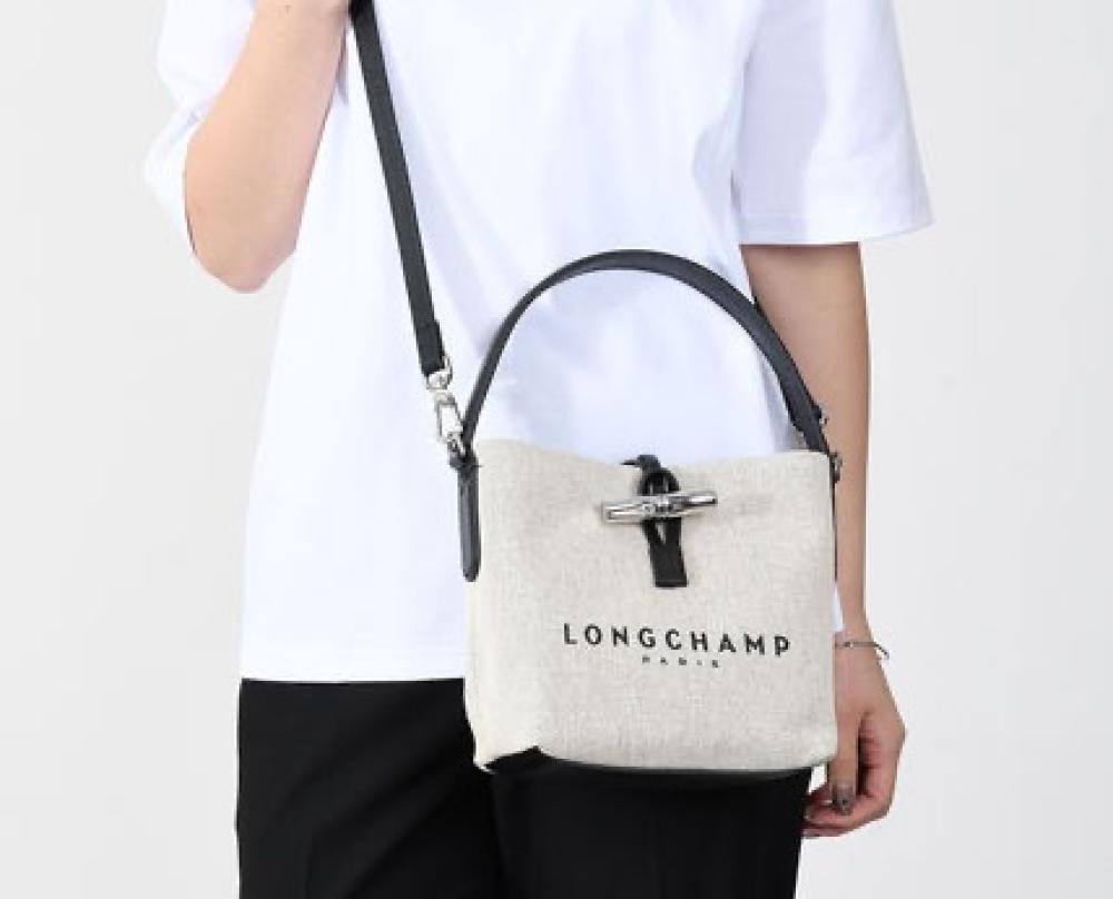 حقيبة longchamp محبوكه القياس:(الحجم الوسط)