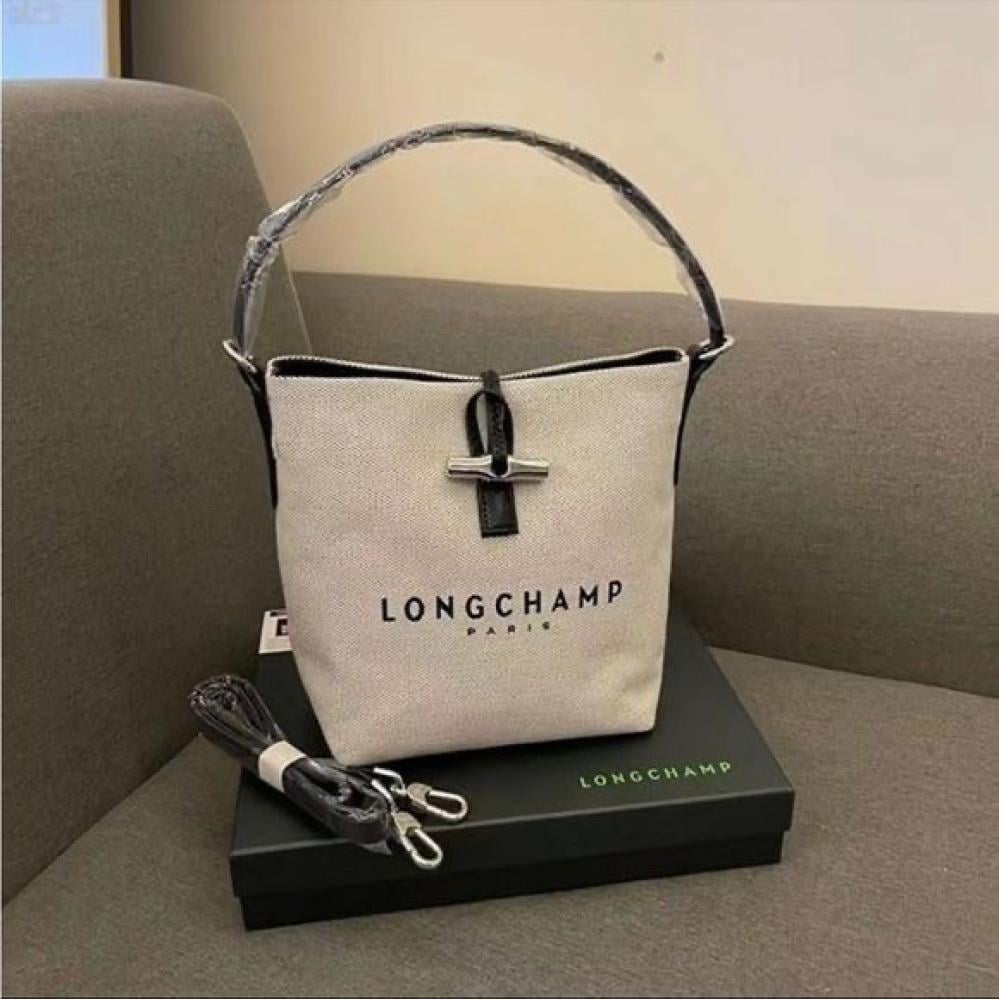 حقيبة longchamp محبوكه القياس:(الحجم الوسط)