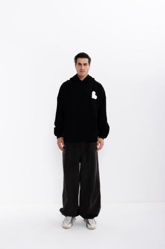 The Staple Hoodie in Black