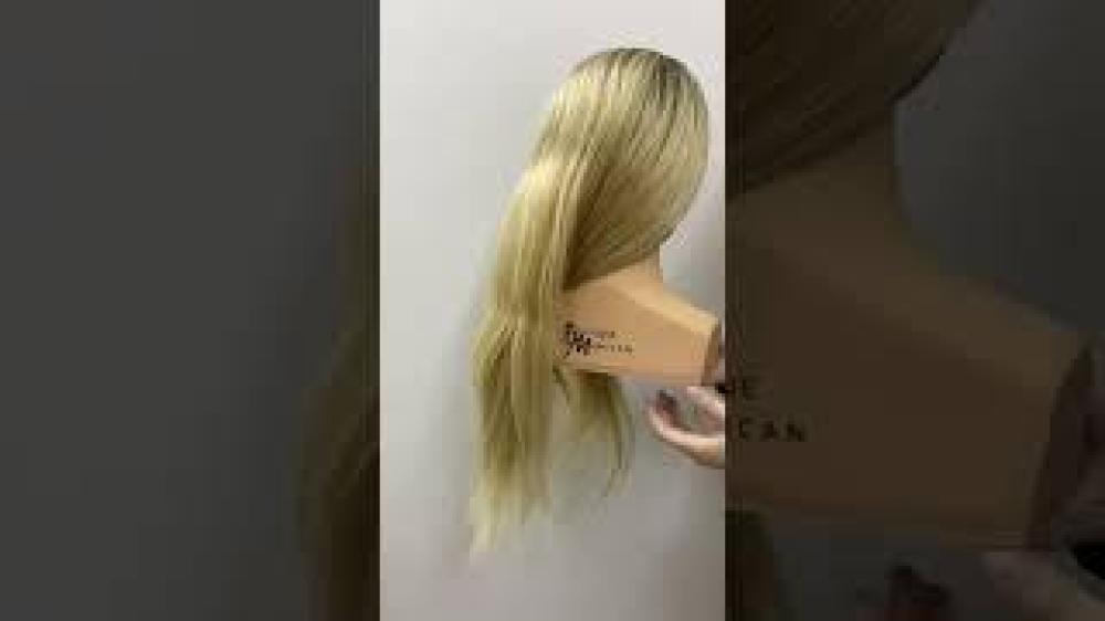 European mannequin with a shoulder and dark roots