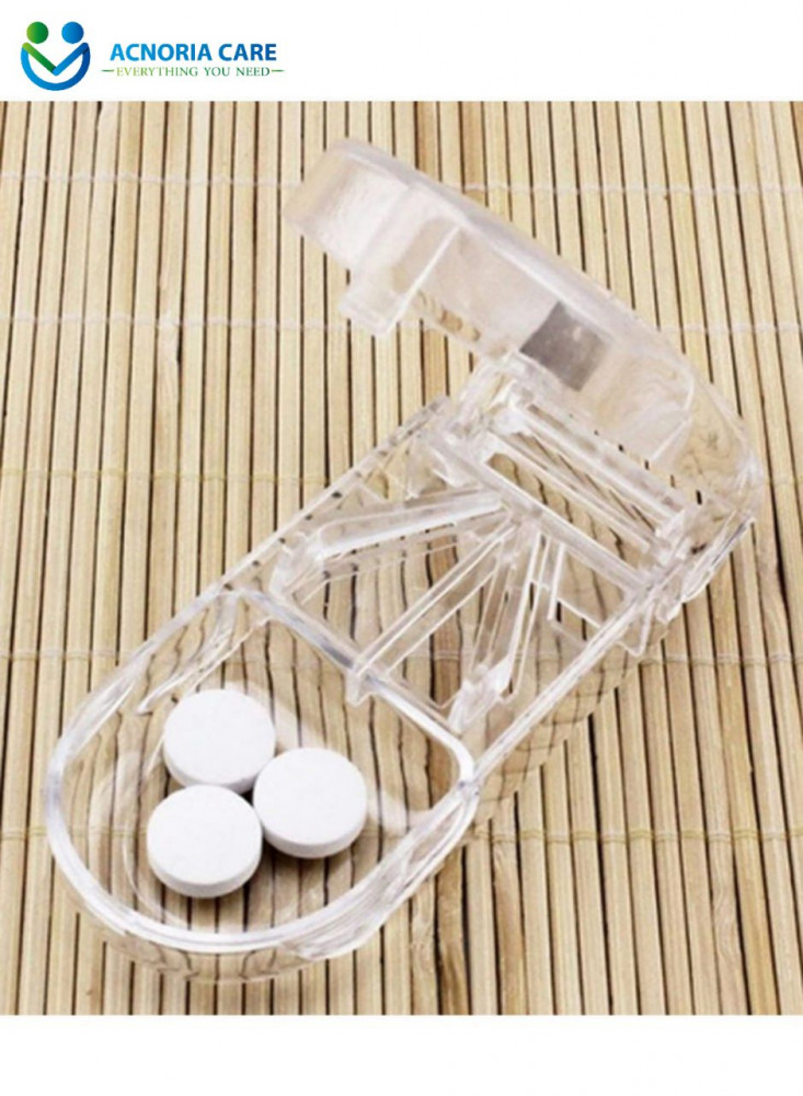 This easy-to-use pill, vitamin and supplement cutter with a compact design  perfect for on-the-go and travel - from Acnoria Care - acnoria care