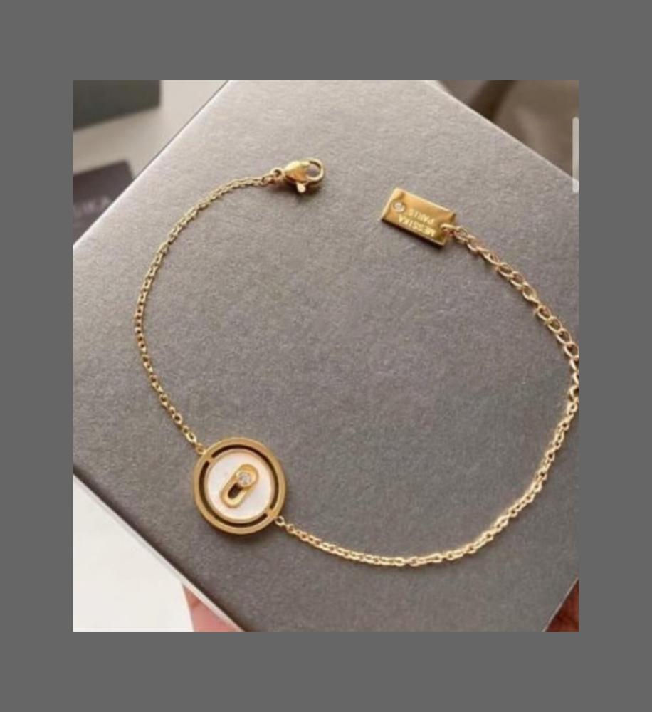 اسوارة ناعمه صدفي ذهبي من RONY&QAFA