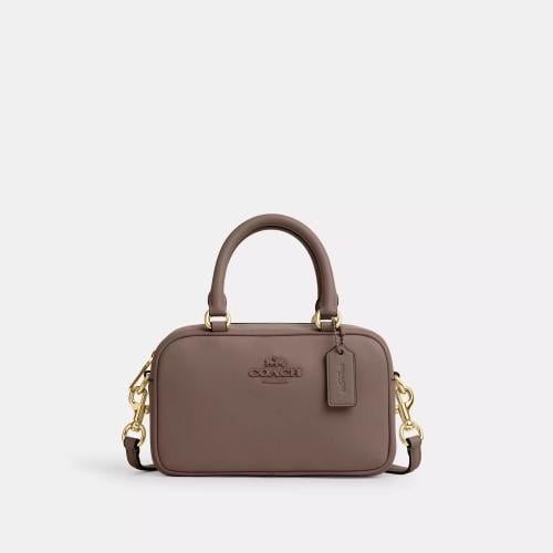 حقيبة كوتش Crossbody