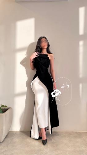 فستان اسود وابيض طويل بفيونكة