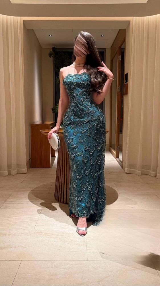 فستان اخضر غامق بتطريز يدوي