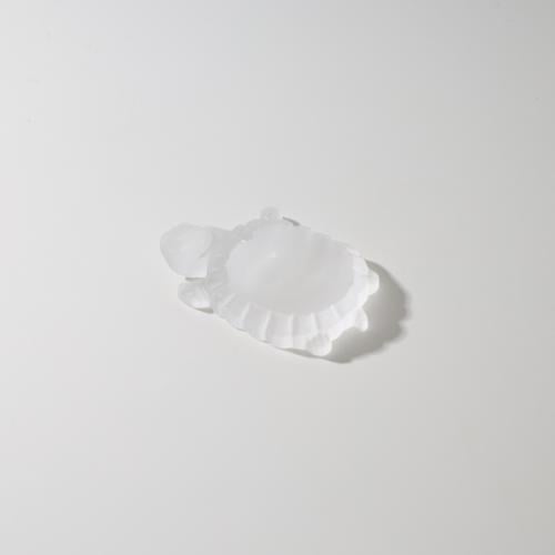 A small turtle-shaped ornament