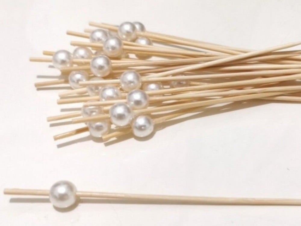 اعواد خشبية بتزين  اللؤلؤ