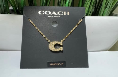 عقد كوتش ذهبي