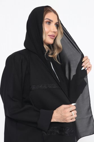 عباية منسوجة من قماش الكريب المنقط الاسود مع طرحته...
