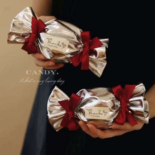 توزيعات بشكل حلوى بدون تعبئه لحفلات الزفاف واستقبال مولود وجميع مناسباتكم 50 حبه