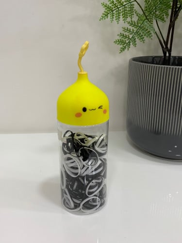 علبة ربطات شعر أسود وأبيض