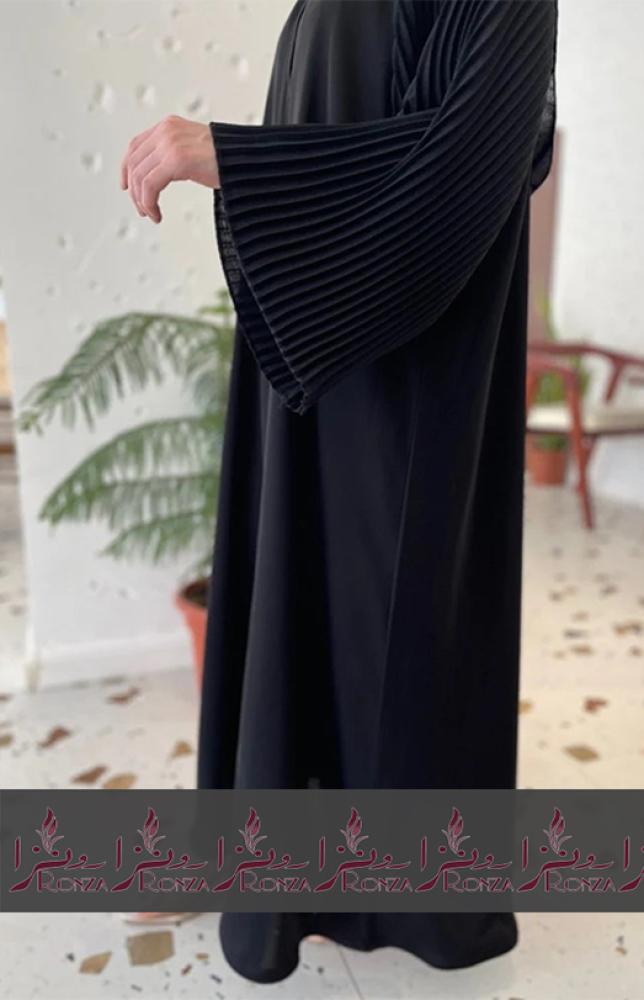 عباية قماش كوري مع تفاصيل عصريه تجمع بين الاناقه والراحه