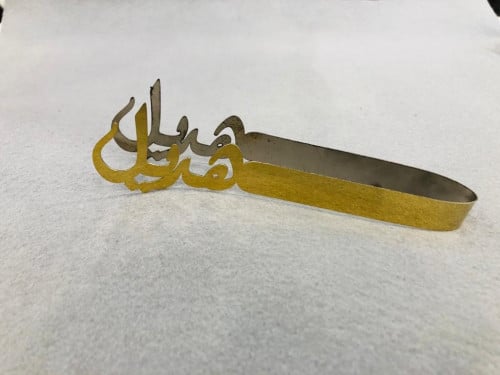 ملقاط هديل . ستيل ذهبي