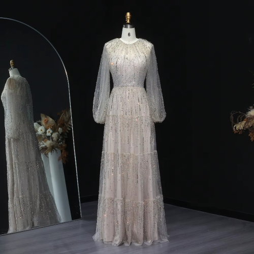 فستان سهرة فاخر اورقانزا مطرز بكم واسع كشكشة