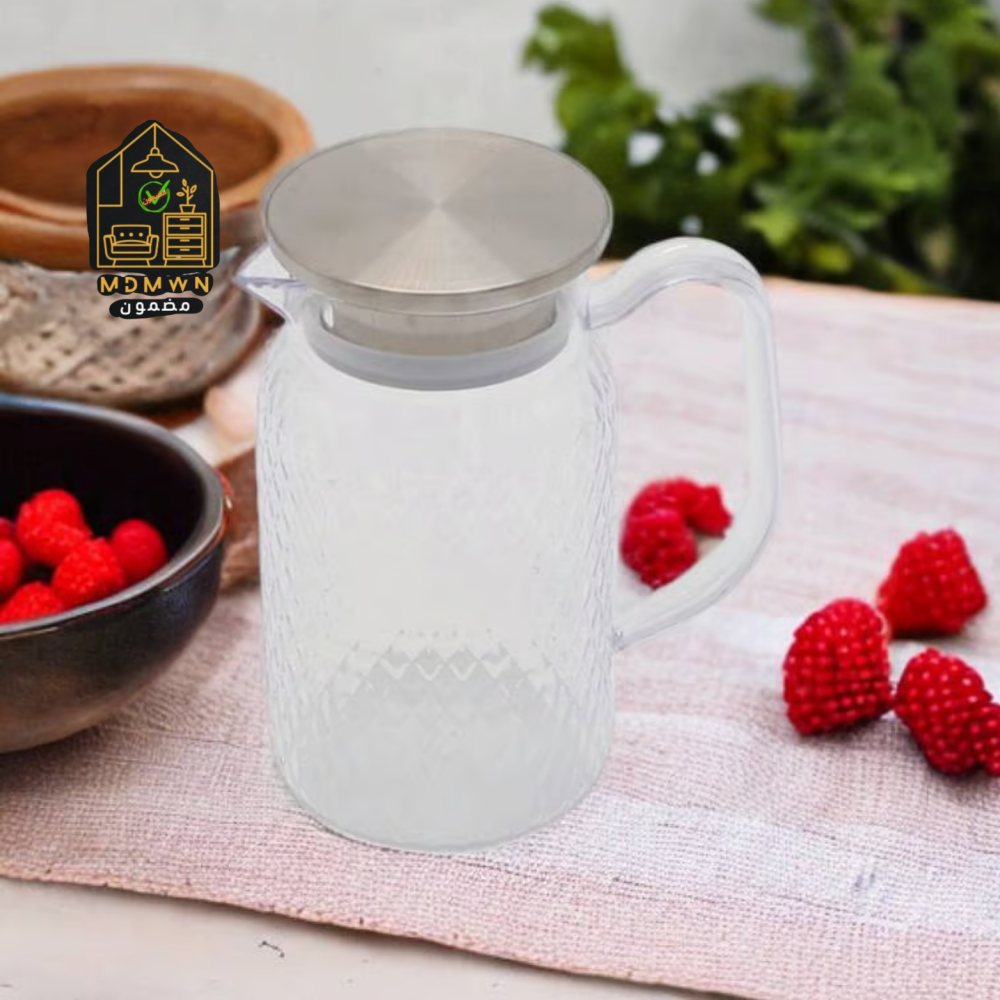 White square glass jug with a round silver lid