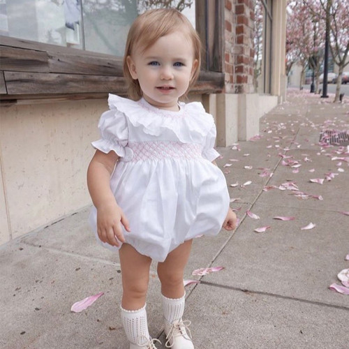 classic baby romper with pink hand embroidery