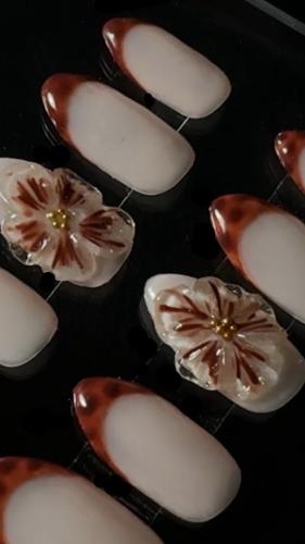Taiger nails with 3D flower