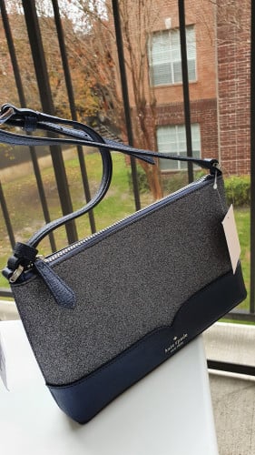 شنطة ماركة كيت سبيد